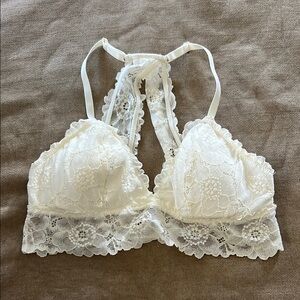 Cream Lace Bra with Plunging Neckline and Adjustable Straps